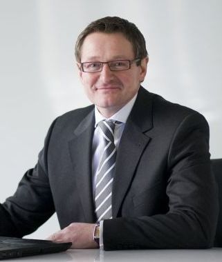 Jürgen Hermann, QSC AG.