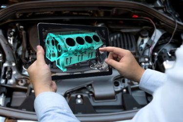Augmented-Reality-Darstellung eines virtuellen Motors auf einem Tablet